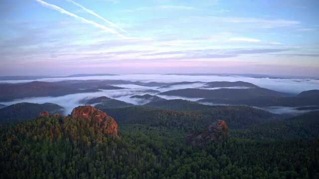 Cinematic High Altitude Aerial Drone Shot Overlooking Vast Natural Landscape and Scenic Horizon View
