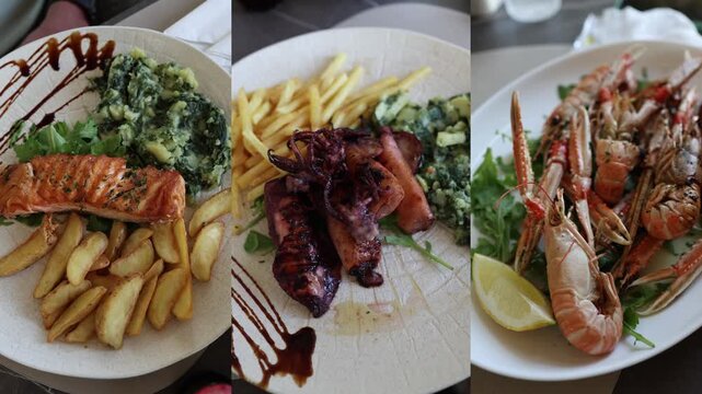 Fresh seafood dishes with grilled salmon squid and langoustines served with potatoes vegetables and lemon create a colorful restaurant dining experience