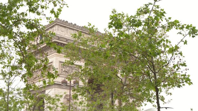 Arc de Triomphe Monument Behind Green Trees in Paris