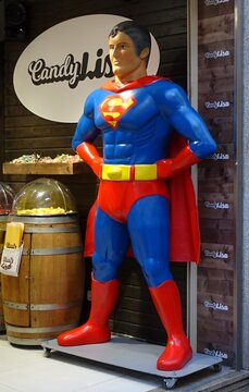Superman statue standing at CandyLisa candy shop entrance
