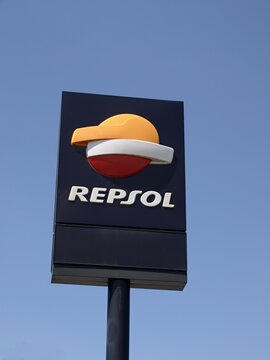 Repsol logo and sign under blue sky