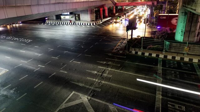 traffic in central bangkok with code and data overlayed in the buildings 