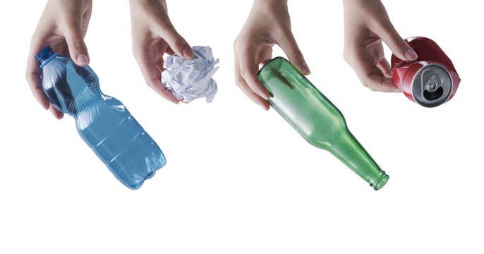Hands Holding Recyclable Materials Plastic Glass Paper and Metal Waste Concept