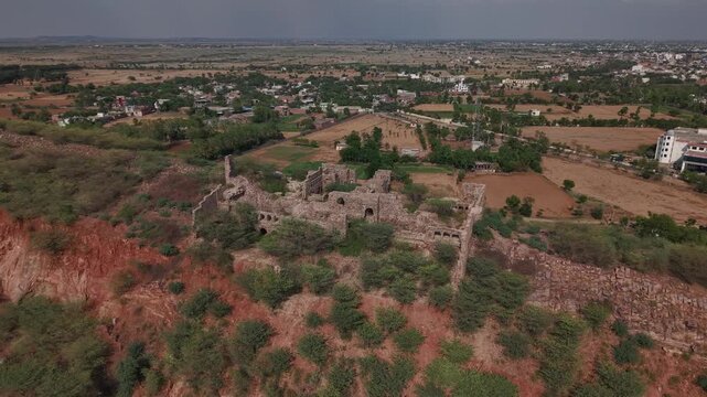 Scenic drone shot of Nuh Fort and Aravalli Hills in Haryana