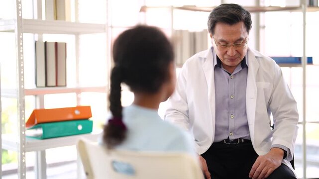 Doctor checking child's broken leg during medical examination, pediatric healthcare, orthopedic consultation, injury assessment, hospital treatment, patient care.