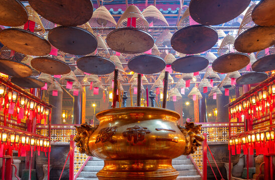 Ritual Bowl and Lanterns Inside a Buddhist Temple