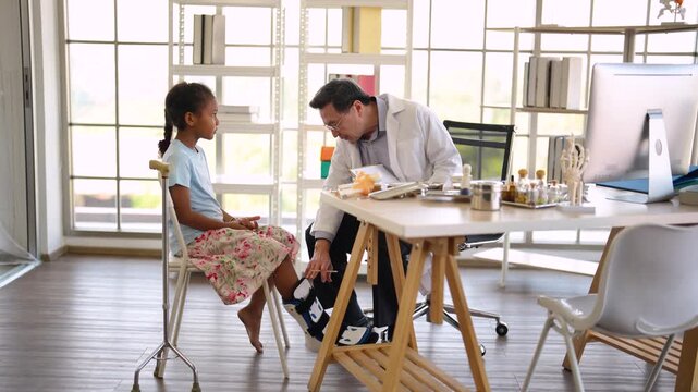 Pediatric patient receiving leg examination from senior doctor, orthopedic assessment, medical consultation, child healthcare, injury treatment, clinical practice.