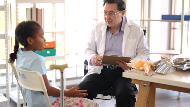 Orthopedic doctor examining child leg after injury, pediatric medical care, healthcare consultation, physical assessment, hospital examination, patient treatment.