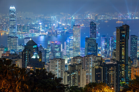 Hong Kong Skyscraper Rooftops and Victoria Harbor at Night