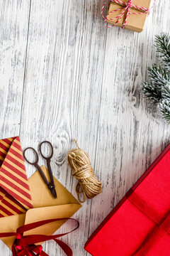 prepare new year and christmas 2018 presents in boxes and envelopes on wooden background top veiw mockup