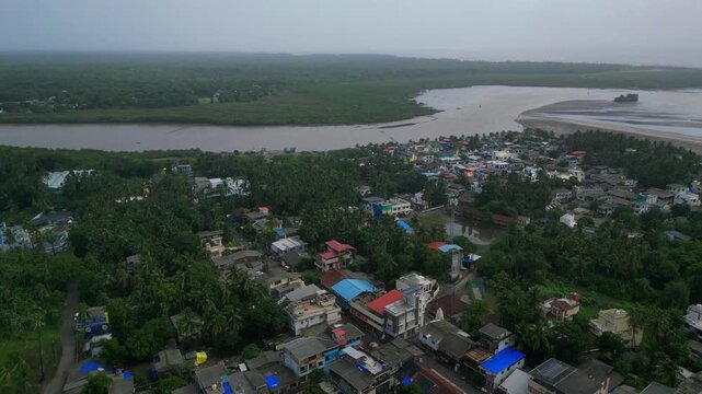 Scenic Aerial View of Kelve Coastal Town and River Meeting the Sea