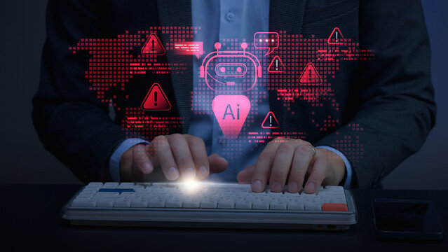 Concentrated businessman hand typing on computer keyboard with red hologram warning light during online ai risk assessment task