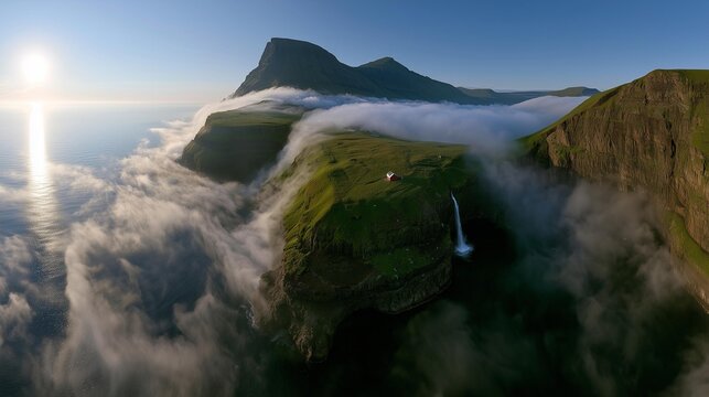 AI generator images of Ultra-wide angle aerial panorama of a green cliff with a prominent red house, grass with a waterfall flowing down from it, surrounded by white clouds and fog, creating a serene 
