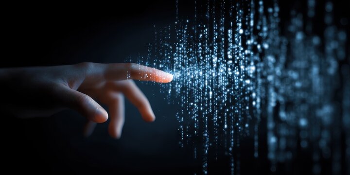 A hand touching a glowing digital stream of data and binary code on a dark background representing information technology and internet connectivity with technology internet connectivity