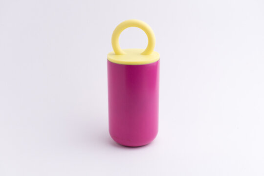 Small pink insulated water bottle thermos isolated on white background