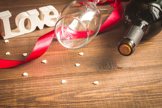 concept Valentine Day with wine at wooden background