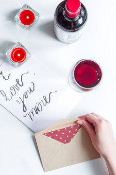 concept of Valentine Day love letter white background top view