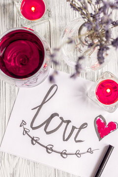 concept Valentine's Day love letter wooden background top view