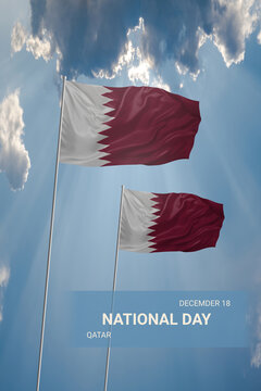 Two flags of Qatar in blue sky with clouds for National holiday