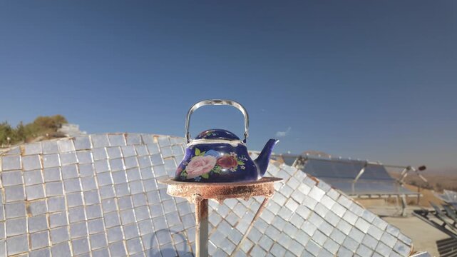 The kettle is heated by a solar parabolic concentrator.