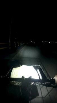 Bicycle Handlebars with Headlight at Night