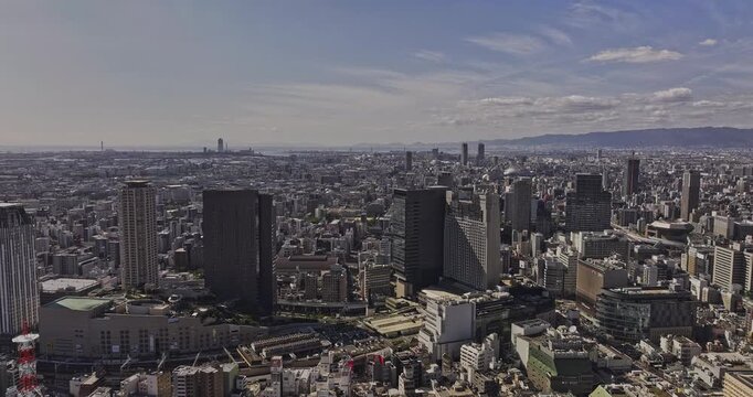 Osaka Japan Aerial v48 flyover above Nanbanaka and Namba, revealing the dense commercial skyline across Naniwa and Chuo wards - Shot with Mavic 3 Pro Cine - Oct 9th 2023