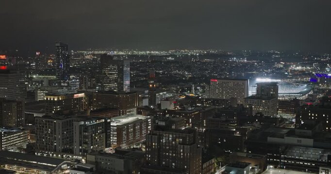 Baltimore Maryland Aerial v67 night flyover above Seton Hill and Sowebo, revealing downtown and illuminated Camden Yards stadium district - Shot with Inspire 3 8k - Sept 28th 2023