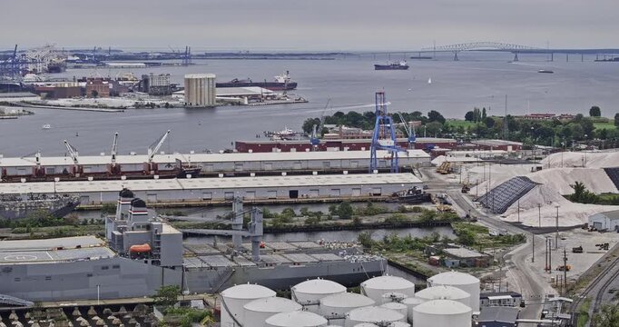 Baltimore Maryland Aerial v86 telephoto flyover above Tide Point and Locust Point, revealing Patapsco River industrial waterfront - Shot with Mavic 3 Pro Cine - Sept 28th 2023