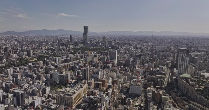 Osaka Japan Aerial v52 flyover above Nanbasennichimae, Nipponbashi and Nanbanaka, revealing Naniwa Ward skyline toward Abeno Harukas - Shot with Mavic 3 Pro Cine - Oct 9th 2023