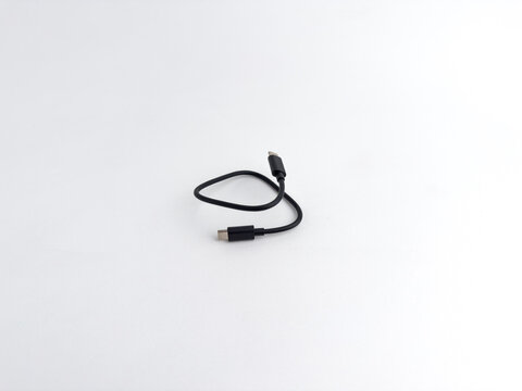 Short black USB type C data and charging cable isolated on white background
