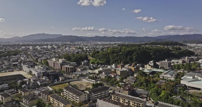 Kyoto Japan Aerial v23 flyover above Shishigatani Takagishicho in Sakyo Ward, revealing hillside neighborhoods beside forested eastern mountains - Shot with Mavic 3 Pro Cine - Oct 7th 2023