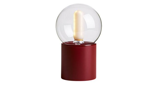 Modern red cylinder base lamp with clear glass globe and filament bulb, isolated on transparent background
