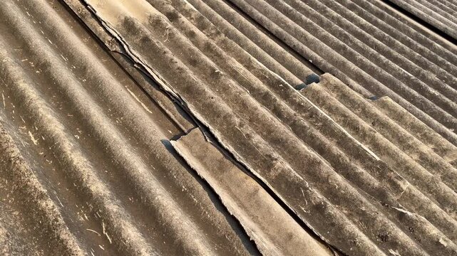 Perspective View of Cracked Corrugated Asbestos Roof Sheet