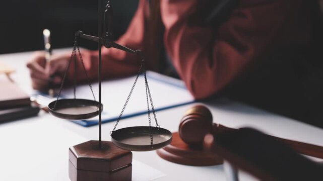 Businesswoman and Male lawyer or judge consult and conference having team meeting with client at law firm in office, Law and Legal services concept
