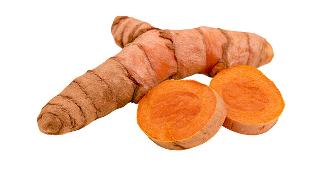 Whole and sliced fresh turmeric root with vibrant orange flesh, isolated on transparent background