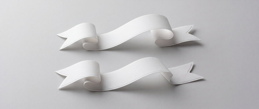 Paper ribbon banners on gray background feature realistic blank white paper scrolls with soft shadows, ideal for web headers, promotional labels, or minimalist design templates
