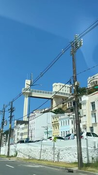 View of Elevador Lacerda from a moving car on the street below in Salvador Brazil