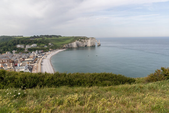 Etretat coastal panorama with the beach and Aval Cliff in the background on the Alabaster Coast, Normandy, France