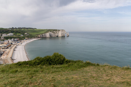 Etretat coastal panorama with the beach and Aval Cliff in the background on the Alabaster Coast, Normandy, France