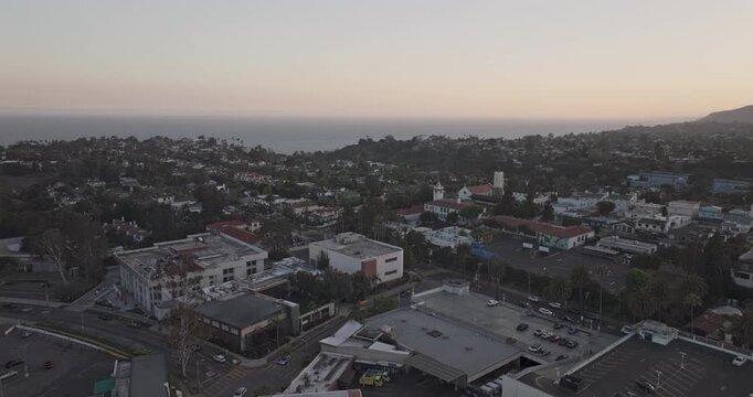 Los Angeles California Aerial v309 orbit above Pacific Palisades Village, revealing hillside neighborhoods and Pacific Ocean beneath a warm sunset - Shot with Mavic 3 Pro Cine - May 26th 2024