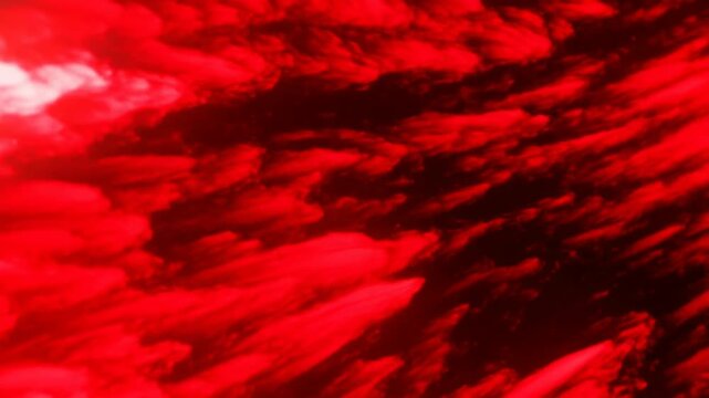 Abstract red and white flowing blur with sweeping diagonal streaks, dense layered smears, soft glowing highlights, vivid contrast, energetic texture, and modern artistic backdrop