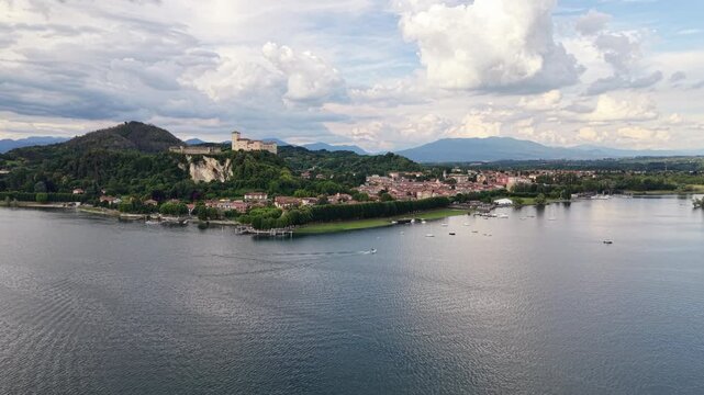 Borromeo Castle above Angera Town on Lake Maggiore - Aerial Dolly In