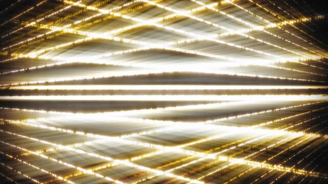 Dynamic abstract animation of glowing yellow lines creating a perspective grid. Perfect for tech, cyberspace, and futuristic data flow concepts.