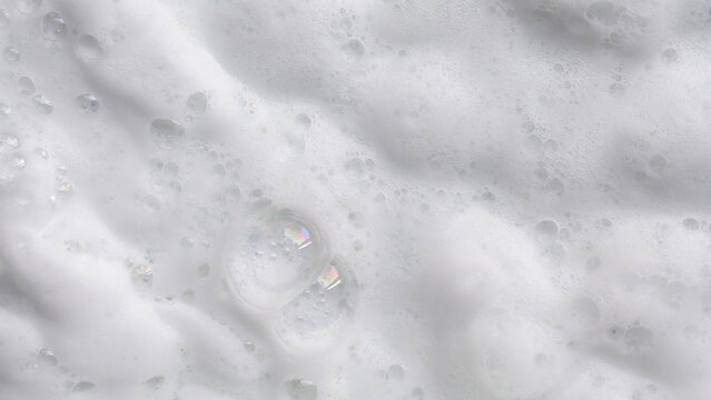 Closeup abstract white soap foam bubbles texture background