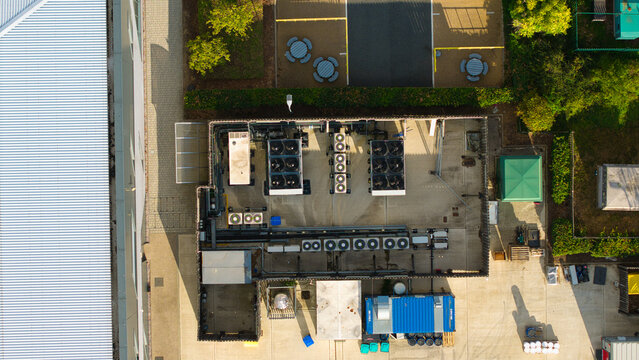 Aerial view of HVAC ventilation and server cooling units installed on the roof of a building at an innovation campus in Harwell Oxford, England, United Kingdom.