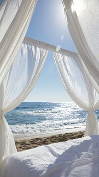 White flowing curtains framing sparkling ocean waves and sandy beach from a luxurious cabana bed on a sunny day