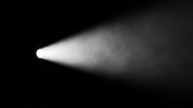 Black background with a close up of an isolated light beam