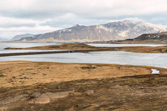 Icelandic coastal landscape with mountain and tidal lagoon