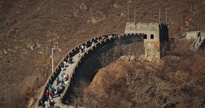 Winding path along ancient wall amidst breathtaking scenery