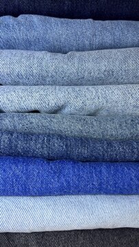 stack of blue towels, jeans